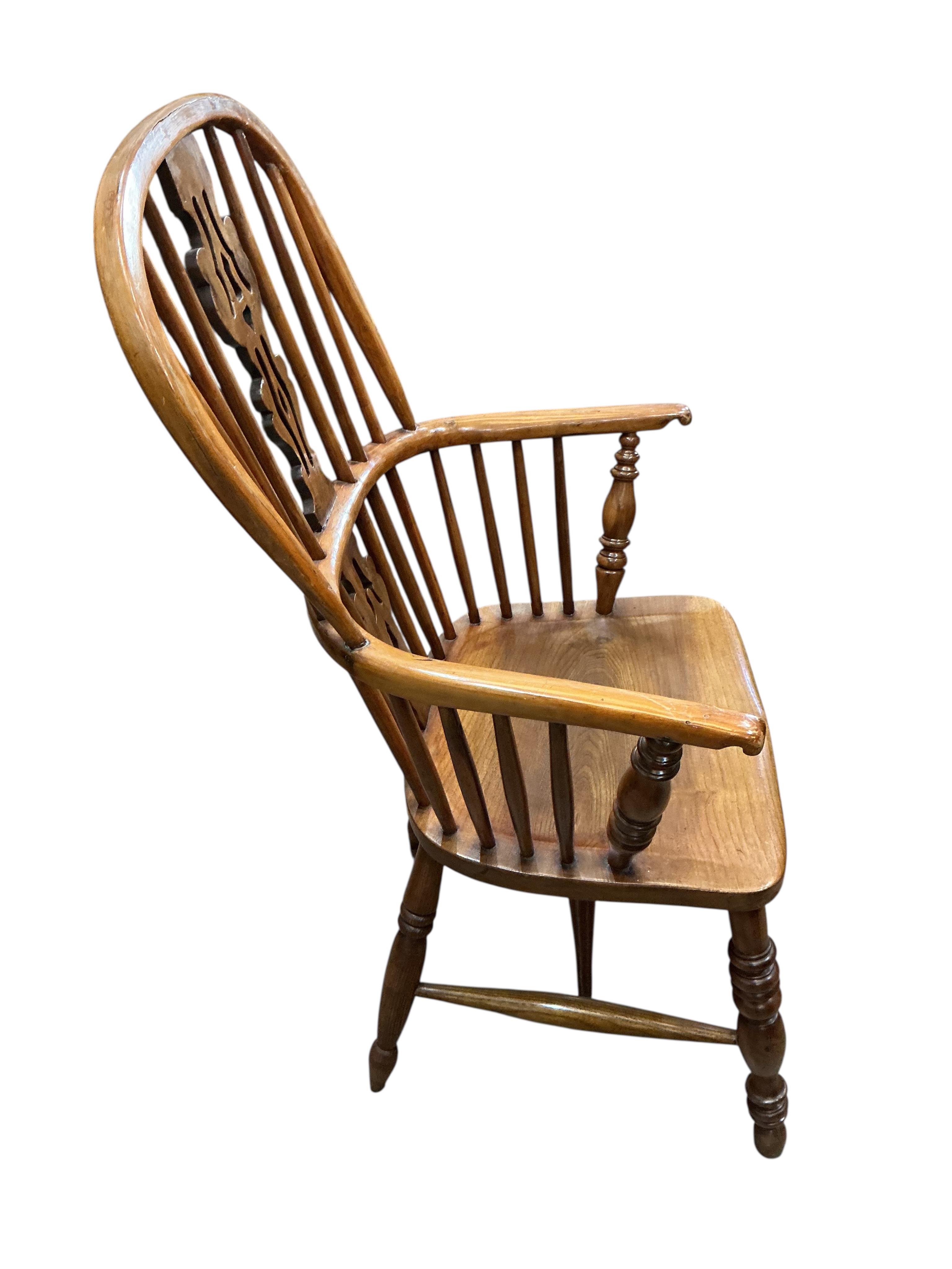 A mid 19th century yew and elm Windsor armchair in the manner of Gabbitass, Worksop, width 60cm, depth 41cm, height 105cm